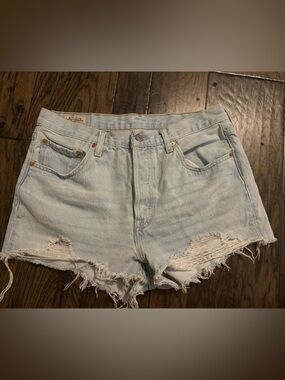 Levi’s 501 Light Blue Distressed Denim Shorts